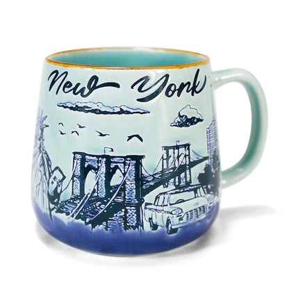 Sky blue ceramic mug with etched New York City skyline design
